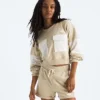 Oversized kort tröja i frotté för damer Oversized kort tröja i frotté för damer