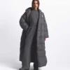 The North Face X SKIMS Nuptse Wrap Parka för damer The North Face X SKIMS Nuptse Wrap Parka för damer